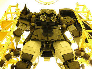 Illustration for article titled Massive Lego Mecha Can Probably Kill Humans, then Drink Ten Packs of Good Ole Fortran